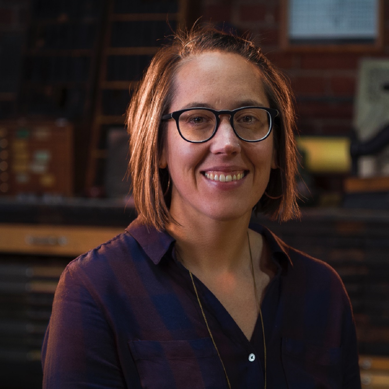 Andres, Co-owner, Presswoman and Designer