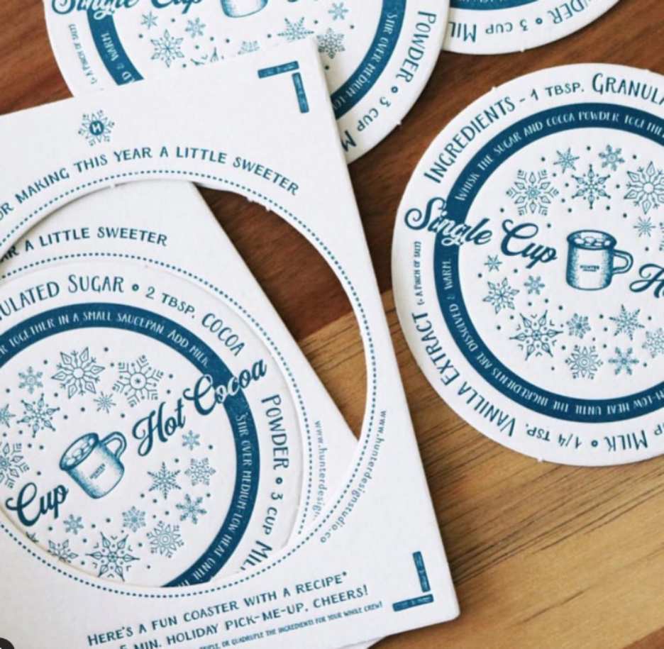 Coaster Mailer Blue on white