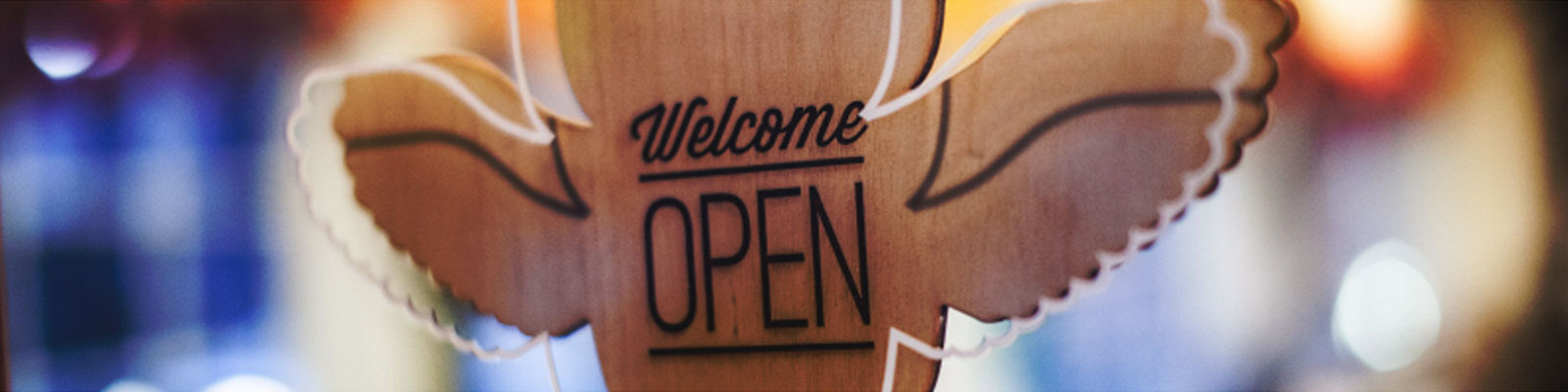 Laughing Owl Press Welcome Sign