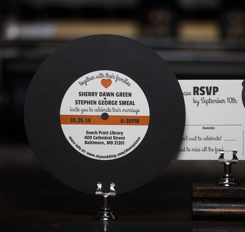 A letterpress printed wedding invitation that resembles a record. 